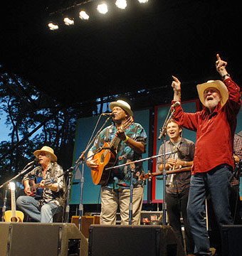 If you're happy: Arlo, Taj, and Pete lead a sing-a-long at the 2009 Revival last year. Photo: Dino Perrucci, via Facebook.